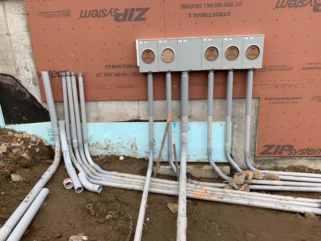Multi-position meter bank and underground service conduits