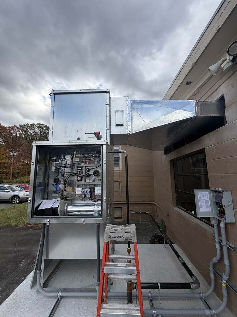 Exterior mechanical unit with disconnect and conduit runs
